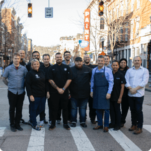 Group of people posing in a crosswalk